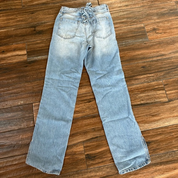 River Island brand jeans. Lace up waist in back. Slit in legs. Uniquez size 8L - Picture 3 of 6